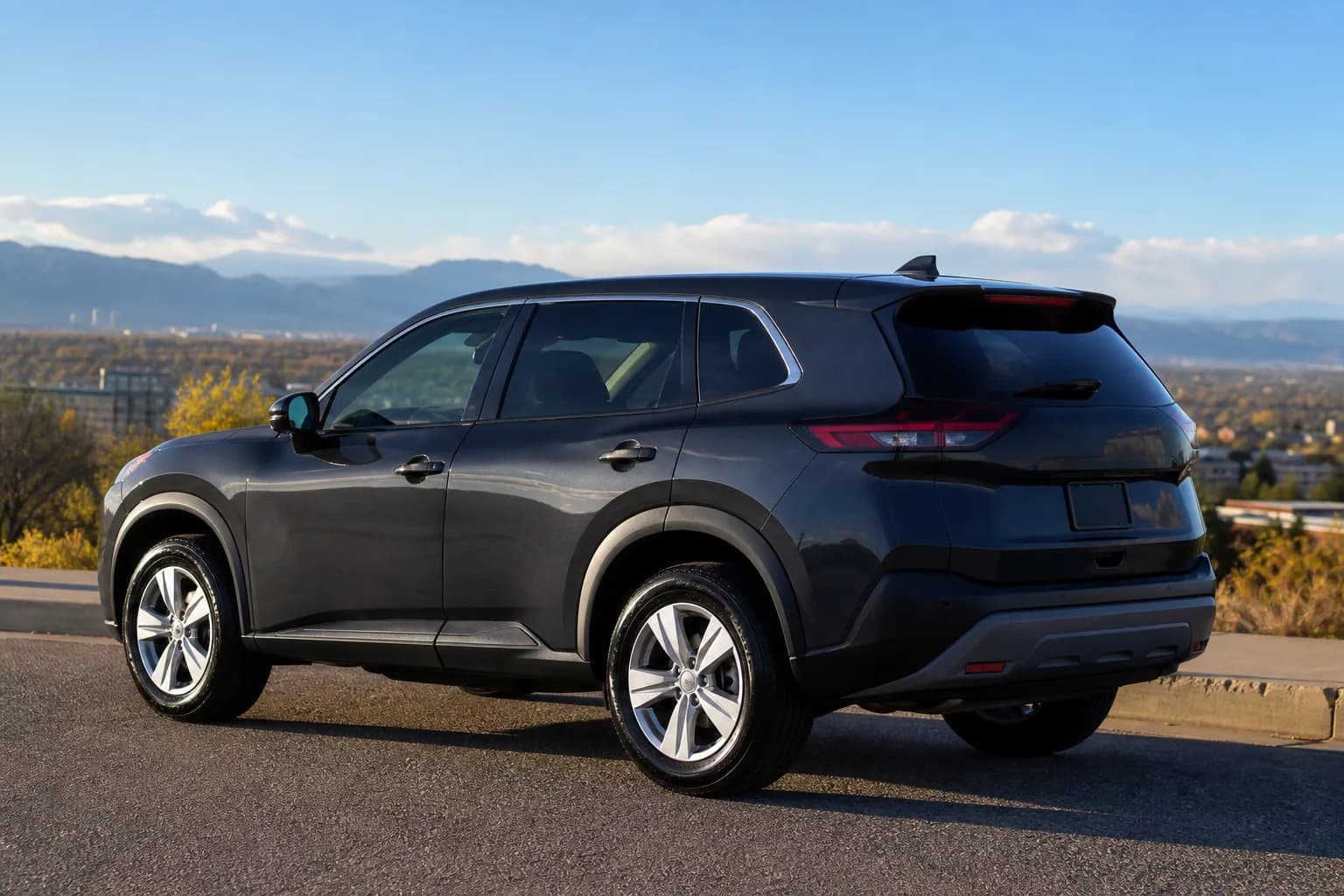 Charcoal SUV after a full detail at a Denver-area overlook